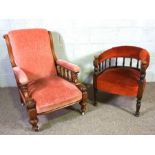 A Victorian walnut framed armchair, with scrolled back, the arms with baluster supports; together