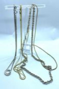 Three 9 carat gold chains, 11g (gross); and two silver chains (5)