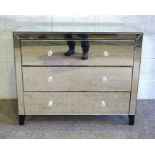 A modern mirrored chest of drawers, 88cm high, 99cm wide;  with two matching bedside tables, 42cm