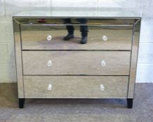 A modern mirrored chest of drawers, 88cm high, 99cm wide;  with two matching bedside tables, 42cm
