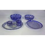 A selection of Continental blue flashed and cut crystal glassware, including two matching