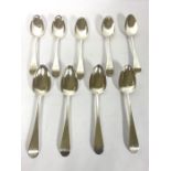 A set of nine Scottish Regency silver Old English pattern table spoons, hallmarked Edinburgh, mainly