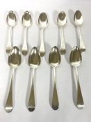 A set of nine Scottish Regency silver Old English pattern table spoons, hallmarked Edinburgh, mainly
