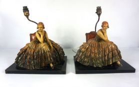 A pair of Capodimonte style Art Deco table lamps, each set with a seated lady holding a rose, both