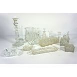 Assorted crystal cut glassware, including a baluster candlestick, bell, various decorative boxes etc