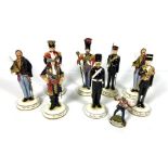 A set of eight decorative regimental figures including the Royal Horse Artillery, 1928 and other