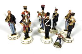 A set of eight decorative regimental figures including the Royal Horse Artillery, 1928 and other