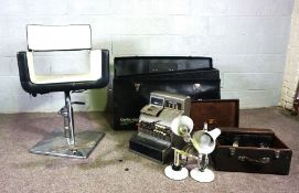 A group of various items including a vintage Hairdressing chair; a cased set of photographers