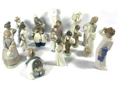 A group of assorted figurines, including a LLadro figure of a Young Girl with Ducks, similar works