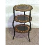 A French style three tier etagere, with marquetry inlay including musical instruments, 77cm high;’