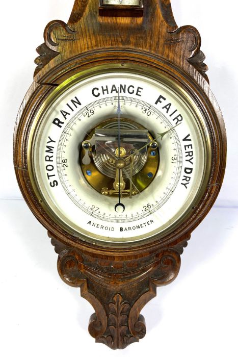 An Edwardian balloon top and inlaid mantel clock, 29cm high; And a Victorian oak cased aneroid - Image 3 of 7