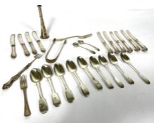 A quantity of silver flatware, including a set of six Edwardian pistol grip silver handled knives,