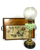 A Victorian brass and ceramic oil lamp, with clear etched glass shade; together with two serving