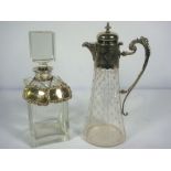 A presentation mallet form spirit decanter, with silver collar; together with a silver plated and