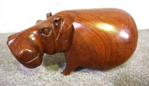 A carved hardwood hippopotamus; together with five model ships, including ‘Flying Cloud’ and two