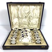 An Aynsley six place cased coffee service, the gilt and Royal Blue decorated coffee cans with silver