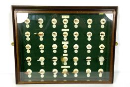 A display case of hand tied fishing flies, including Dry, Wet and Salmon flies, 20th century, 45cm x
