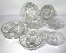 A large assortment of table glassware and other decorative cut glass bowls, decanters and other