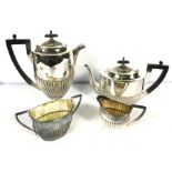 A four piece silver plated tea service, by Walker & Hall, of typical part fluted form, stamped 'Hard