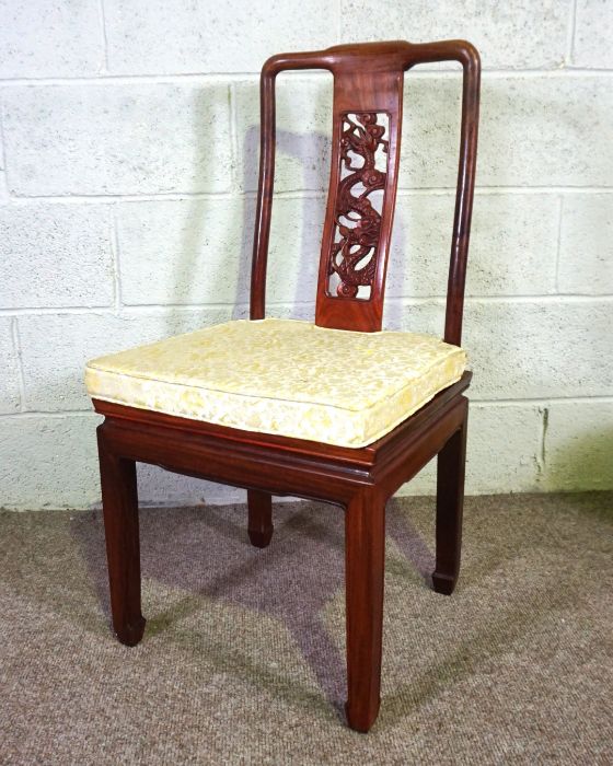 A Chinese hongmu or hardwood dining suite, including an extending oval dining table, and a set of - Image 3 of 14