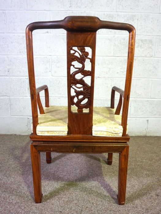 A Chinese hongmu or hardwood dining suite, including an extending oval dining table, and a set of - Image 10 of 14