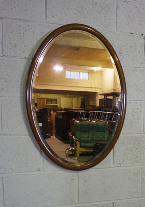 An Edwardian oval mirror on stand, with carved supports, 73cm high, 82cm wide; and another oval - Image 7 of 10