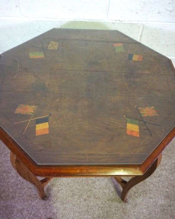 A vintage ‘Entente Cordial’ occasional table, the octagonal top inlaid with crossed flags, 20th - Image 2 of 2