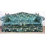 A large and comfortable Knole style sofa, circa 2000, with a deep seat, curved out arms and faux