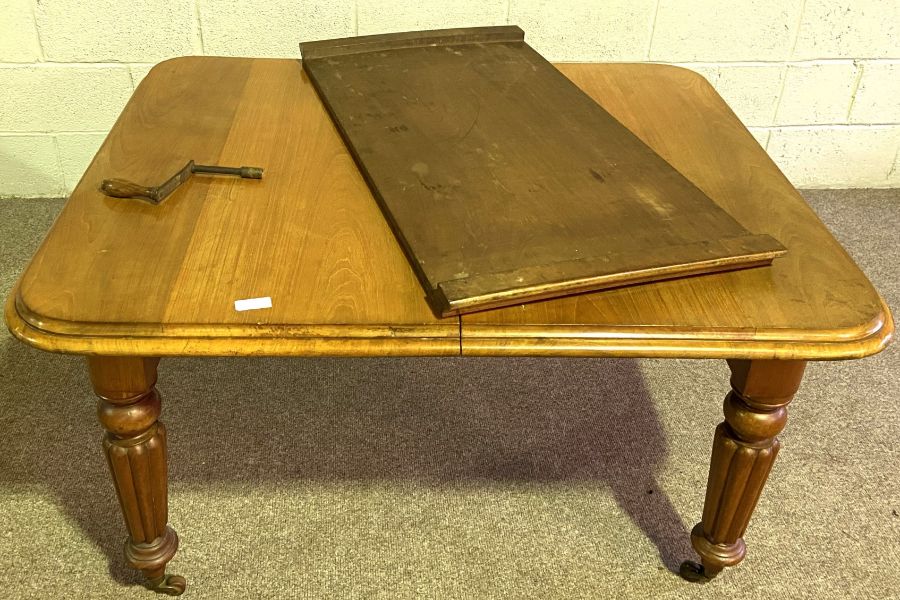 A Victorian mahogany extending dining table, with additional leaves set on for ring tanned and lobed - Image 2 of 3