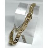 A 9 carat gold ‘Greek Key’ bracelet, clasp marked 375, KE, 19.5cm long, 10g