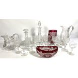 Quantity of assorted glass and decanters, including two ruby flashed cut glass vases, four decanters