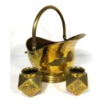 A brass helmet coal scuttle, together with vintage brass and stained glass panelled firescreen; also