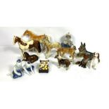 A group of assorted ceramic animals, and figurines, including Horses, a Donkey, a German Shepherd