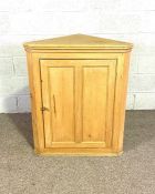A stripped pine corner cabinet; together with a vintage Deco style longcase clock; a Victorian piano