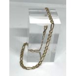 A 9 carat gold curb link necklace, 48cm long, marked 375, together with two 9 carat gold