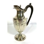 A Victorian silver claret jug, hallmarked Sheffield 1894, John Dixon & Sons, of typical waited form,