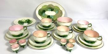 An attractive Victorian Minton's Majolica "Lily Pad" part tea service, 19th century, with blush pink
