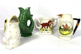 Staffordshire pottery novelty tankard, with surprise frog, the sides decorated with hunting dogs