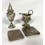 A small group of silver, including a George III silver cream jug, marks rubbed; together with two