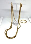 An assortment of costume jewellery, including a gold plated chain necklace, assorted brooches etc (a