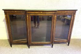 A late Victorian inlaid mahogany breakfront bookcase, circa 1900, with three bevelled glass