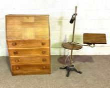 A modern oak veneered bureau, 72cm wide; together with a cast iron based adjustable reading stand,