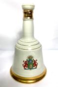 A Haig Dimple Whisky souvenir decanter, Commonwealth Games 1986, in original packaging, the whisky