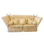 A modern Knole sofa, circa 2014, of typical form, with hinged side arms, a high back, with