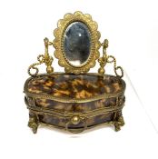 A tortoiseshell and gilt metal ladies jewelry casket, 19th century, in the form of a Bombé