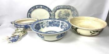 A large assortment of ceramics, including a Wedgwood ‘Willow’ wash bowl and other blue and white