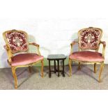 A pair of Louis XVI style upholstered armchairs, currently upholstered in pink and a small Chinese