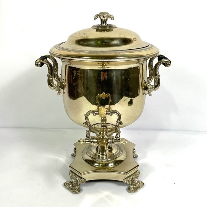 A vintage silver plated Samovar, of typical form, with scrolled side handles and set on a platform