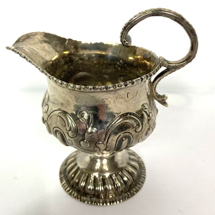 A small group of silver, including a George III silver cream jug, marks rubbed; together with two - Image 6 of 15