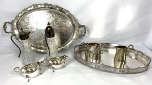 A quantity of silver plate, including a large galleried tea tray; another large tray with fruit of